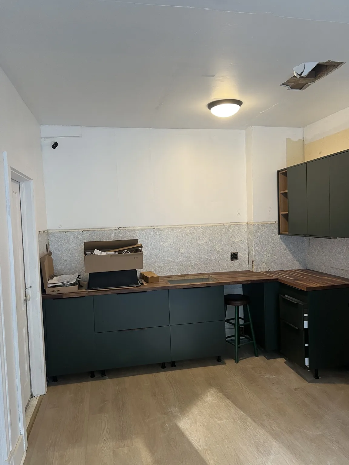 Dark Green Kitchen with Wood Accents — photo 1