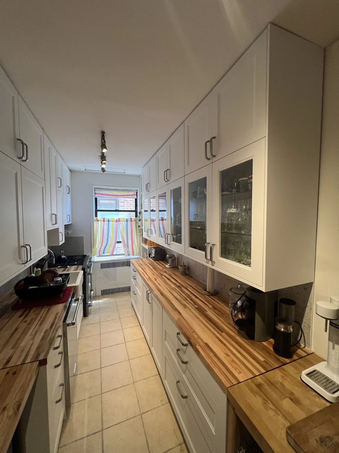 White Shaker Galley Kitchen — photo 1