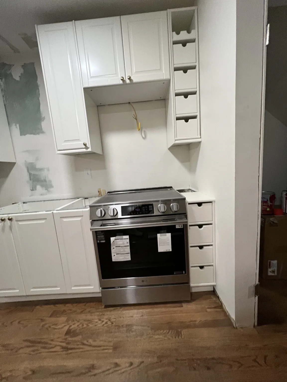 White Kitchen with Stainless Range — photo 1